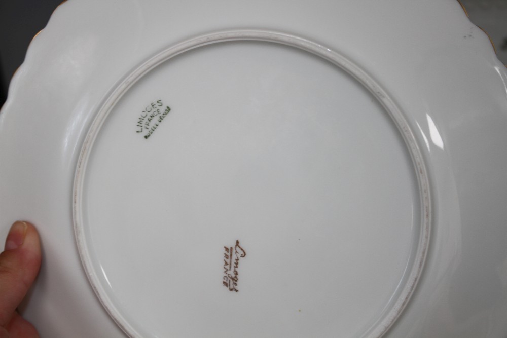 A Limoges thirteen piece porcelain fish service, printed with pike and other freshwater fish